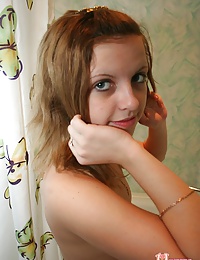 Condom covered cock enters into a tight teen vagina.