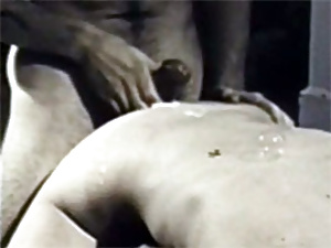 Fifites guy shooting his thick spunk all over her retro back