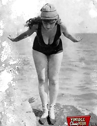 Several sixties beach babes posing naked on a public beach