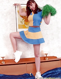 Horny cheerleader shows her perfect boobs