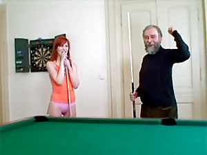 Teenage redhead pleasing a senior cock after a game of pool