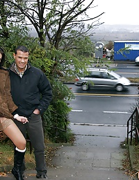 Sexy willing brunette is sucking his erect dick in public